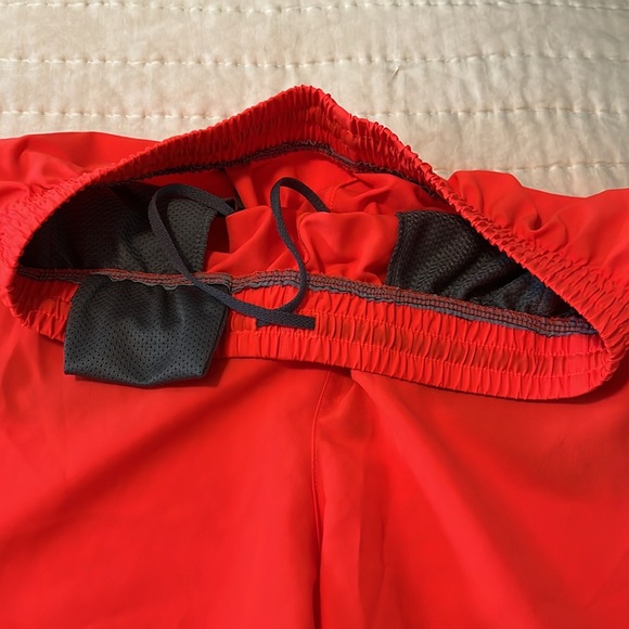 Under Armour 5in shorts. Size Large. Orange - Picture 2 of 4